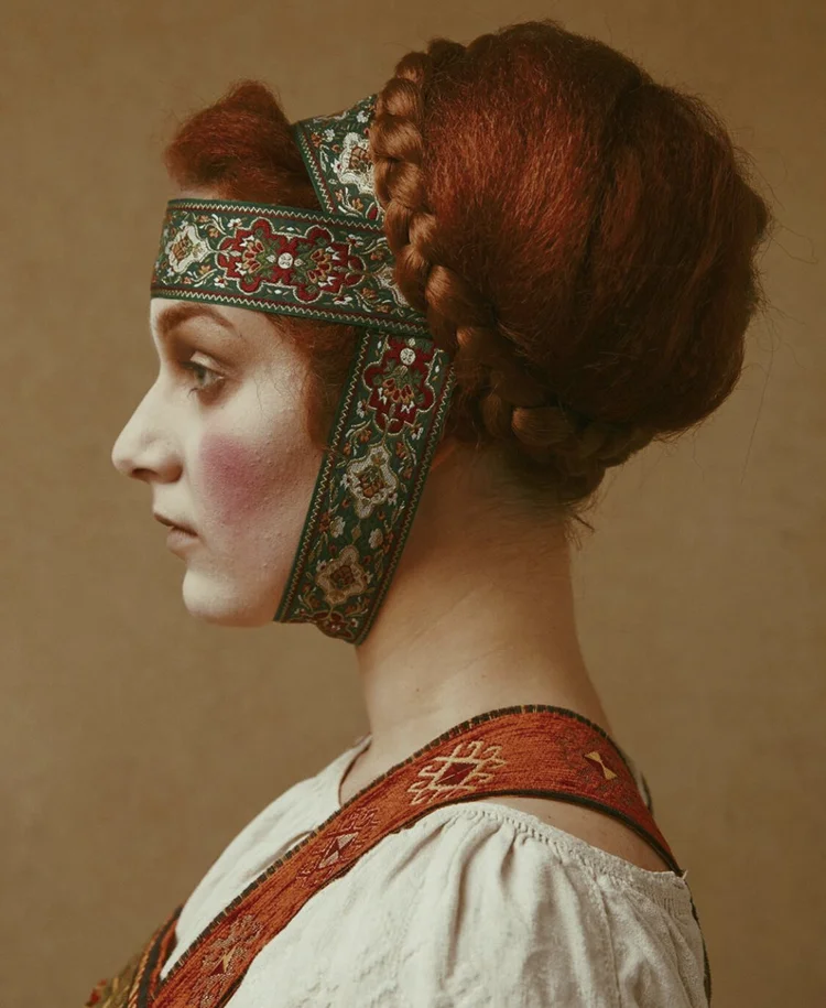 Embroidered ribbon wrap paired with a braided crown