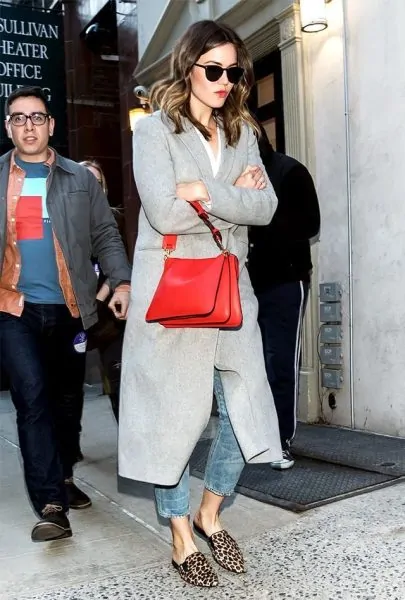 Leopard print mules worn with a long structured coat