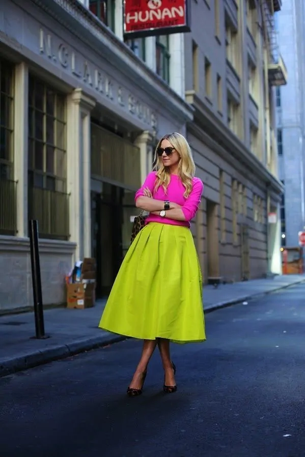 Dark pointed mules with a hot pink blouse and lime midi skirt