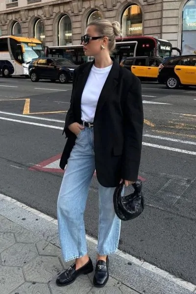 Black blazer with a white top and jeans and loafers