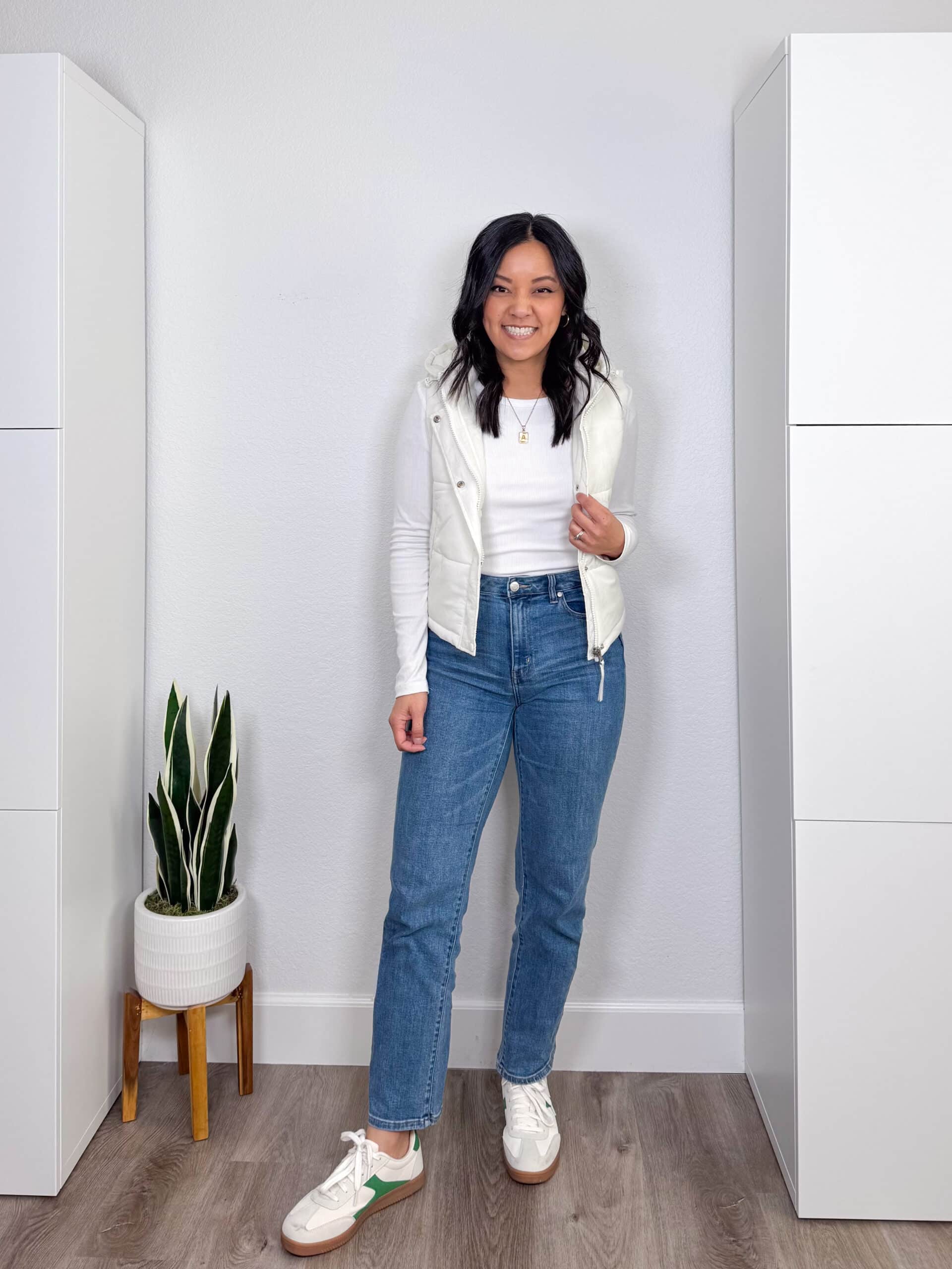 White Tee with a Puffer Vest and Straight Jeans cute jeans outfit