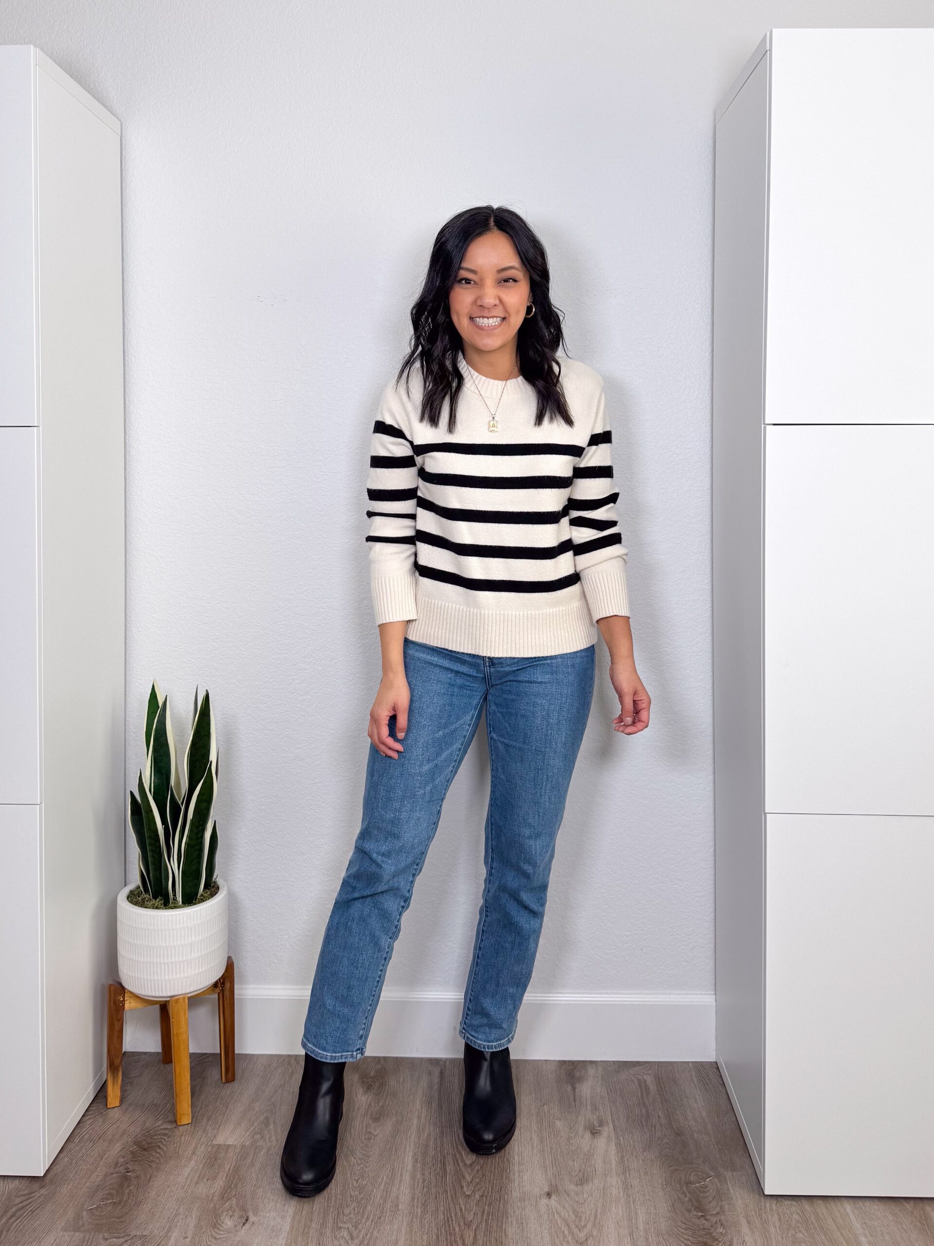 Printed Sweater with Medium-Wash Straight Jeans and Black Boots cute jeans outfit