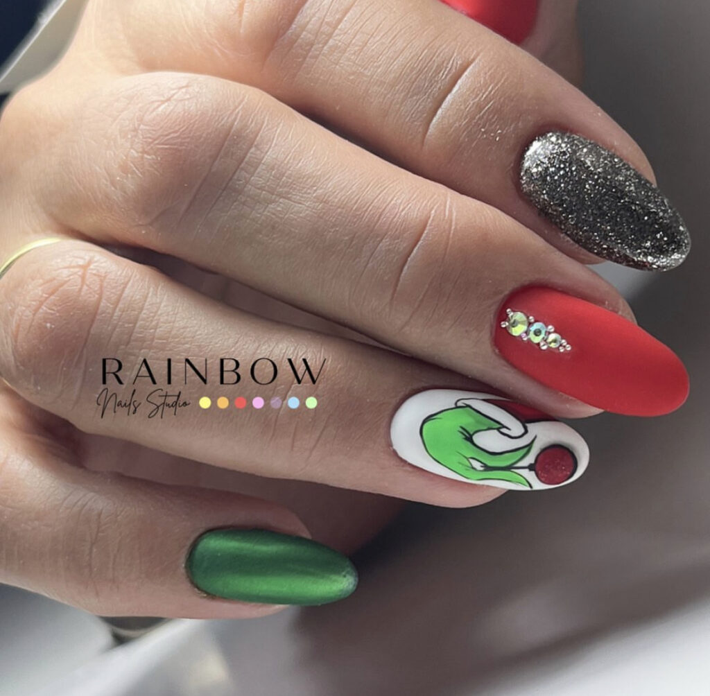 Minimal Grinch Nails for a Quiet Christmas grinch christmas nail design