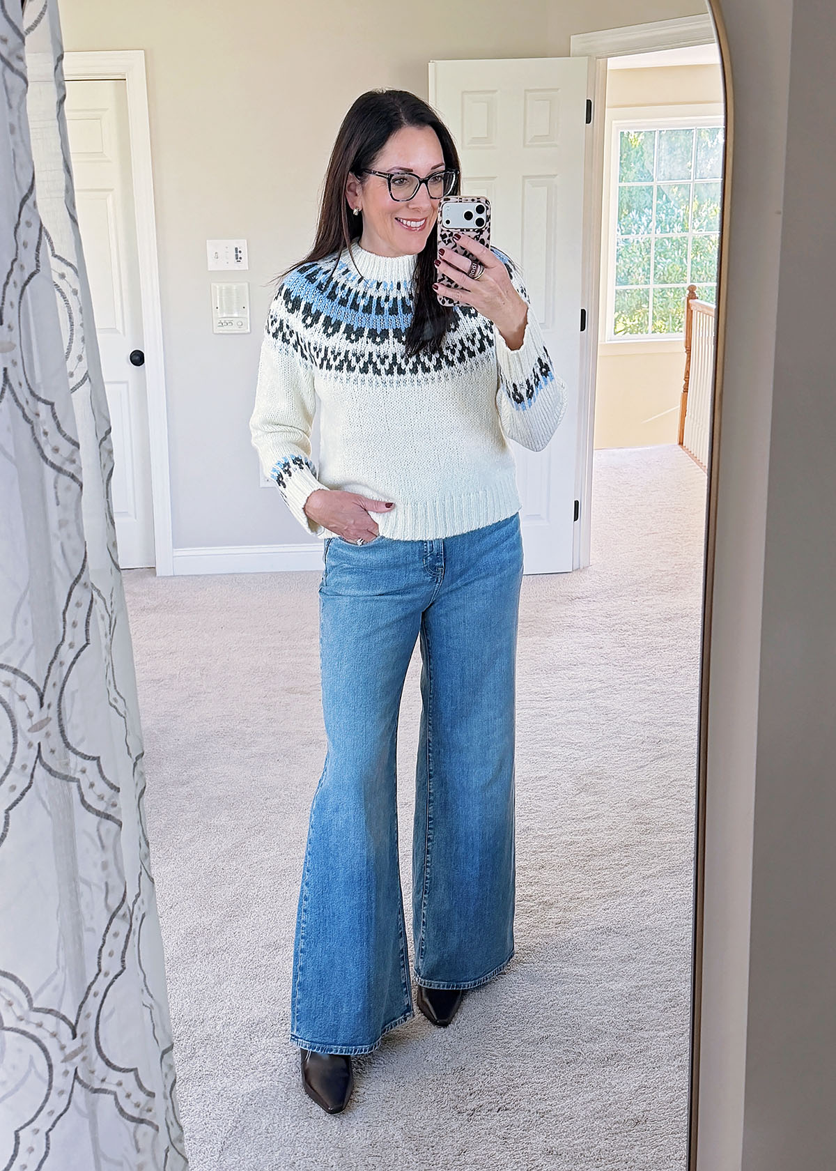 Fair Isle Mock-Neck Sweater With Relaxed Denim Trousers christmas party outfit