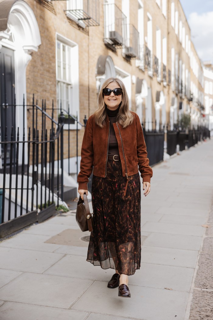 Brown sweater with a suede jacket and loafers London outfit