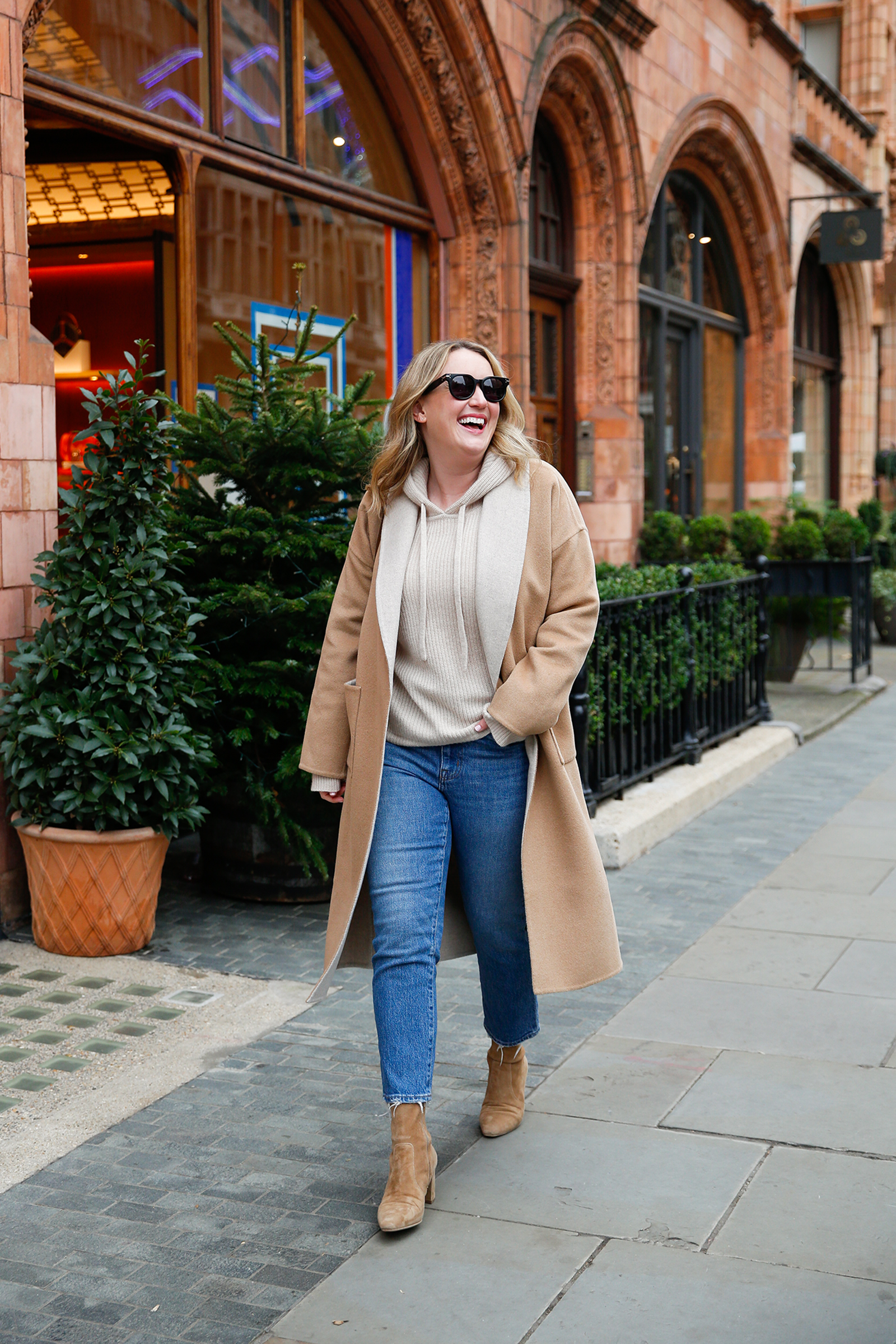 Cashmere hoodie layered under a wrap coat London outfit