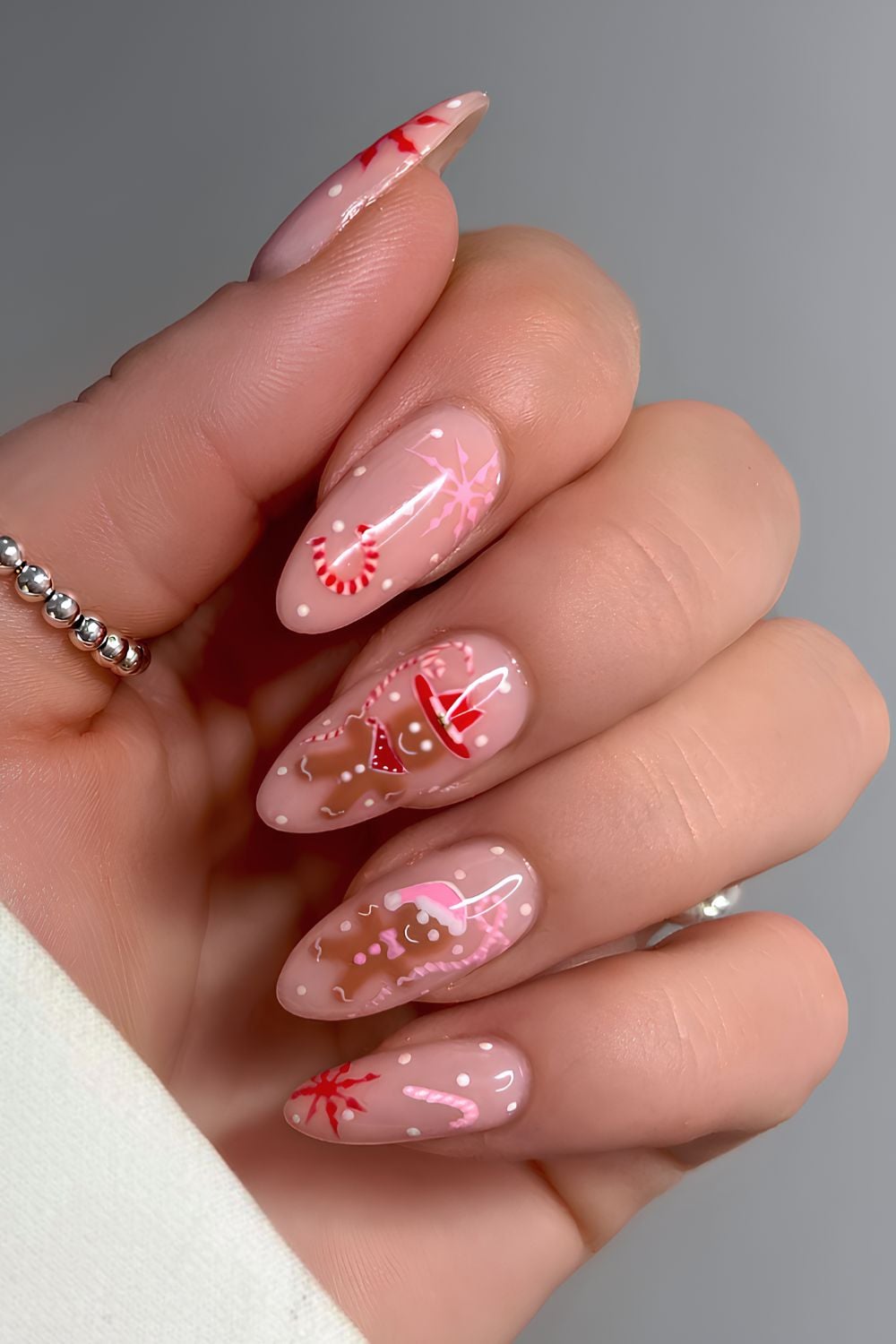 Gingerbread and Candy Cane Coffin Nails gingerbread nail manicure