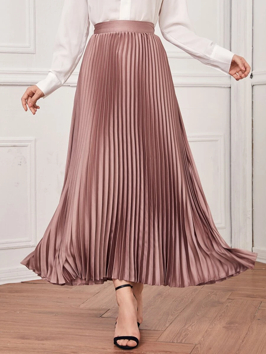 High-waisted pleated satin skirt styled for a polished modest outfit