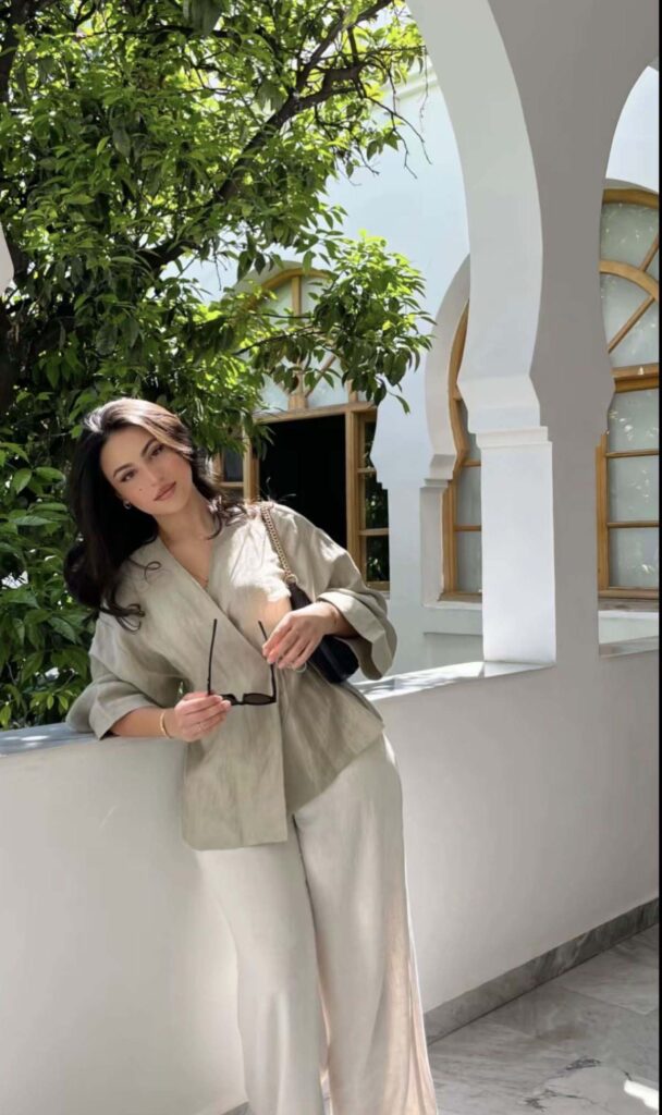 Sage linen blouse with cream wide-leg trousers church outfit