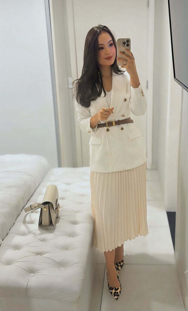 White blazer with a nude pleated skirt and leopard heels church outfit