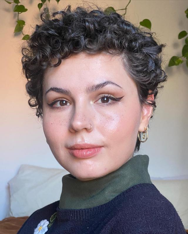 Natural curly pixie in black short hair hairstyle