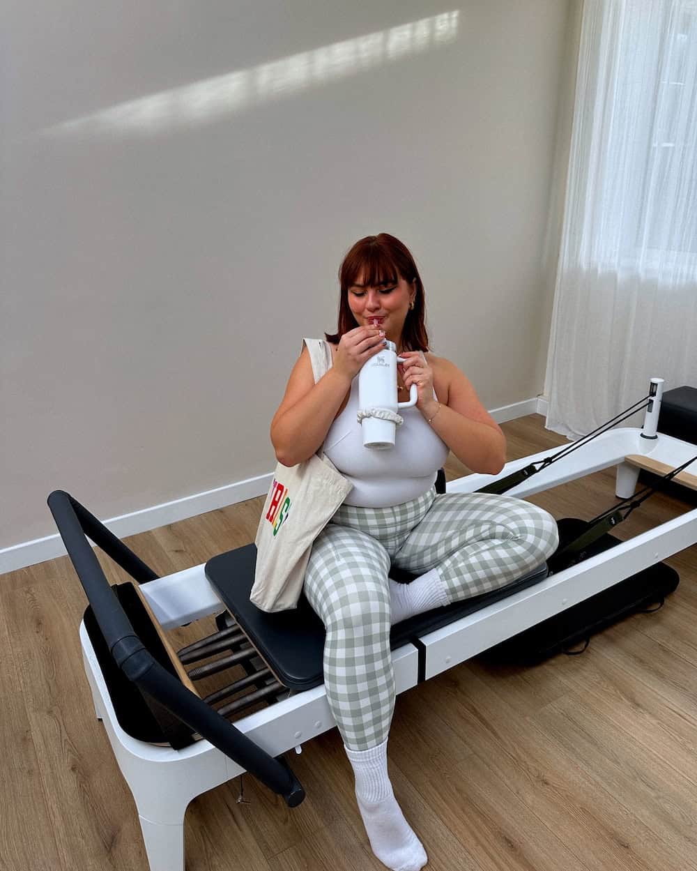 Sage gingham leggings with white fitted tank pilates outfit