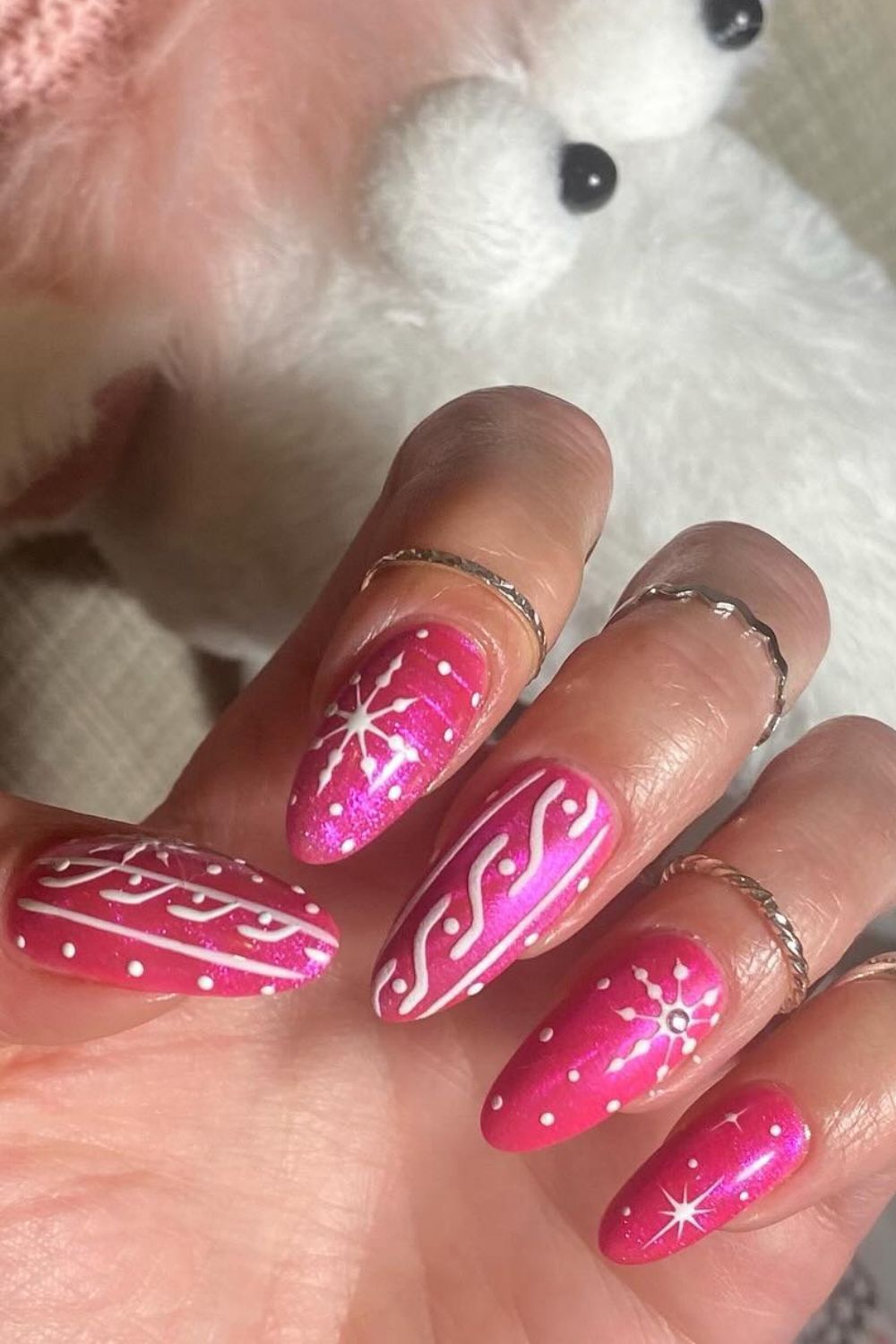 Hot Pink Shimmer Snowflake Almond Nails snowflake nail art design