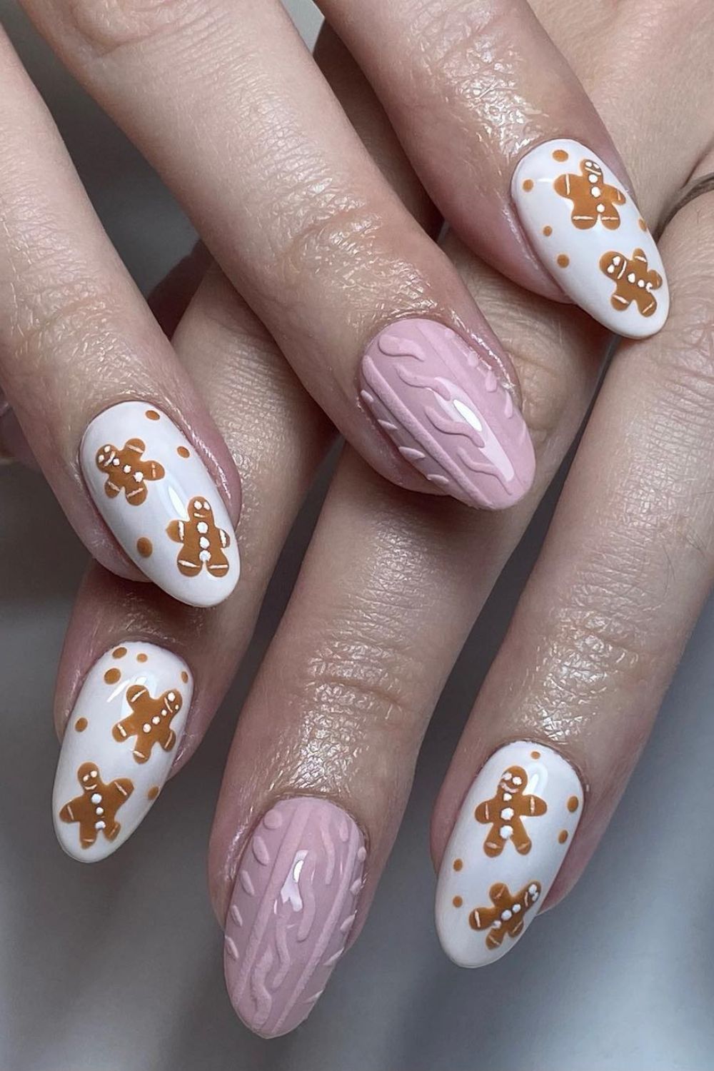Gingerbread Men and Pink Cable-Knit Nails snowflake nail art design