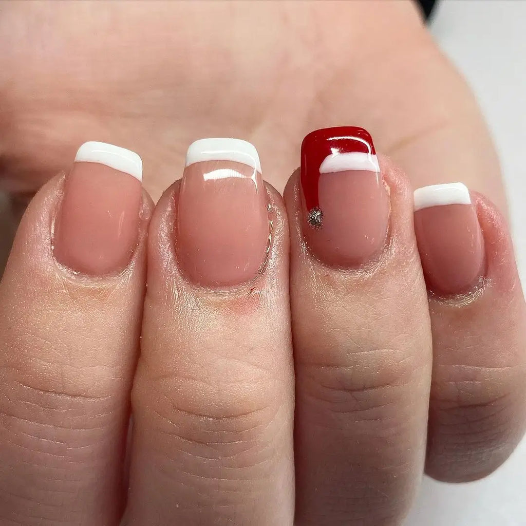 Glitter-Packed Tips and Fluffy Trim on Long Ballerina Nails santa hat nail design
