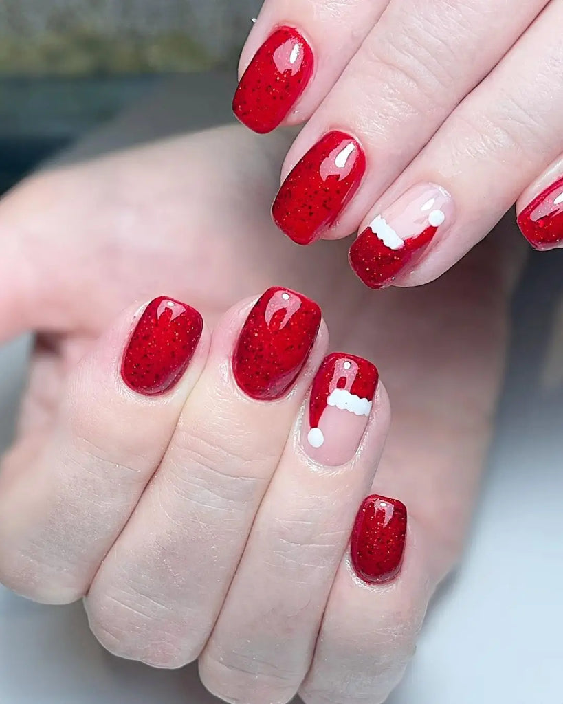 Classic Red Santa Hat Tips on Long Almond Nails santa hat nail design