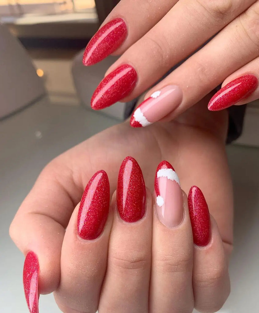 Candy Cane Stripes Beside Santa Hats on Oval Nails santa hat nail design