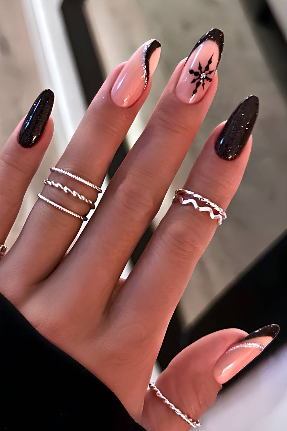 Silver Swirls and Snowflakes over Shimmering Black black Christmas nail design