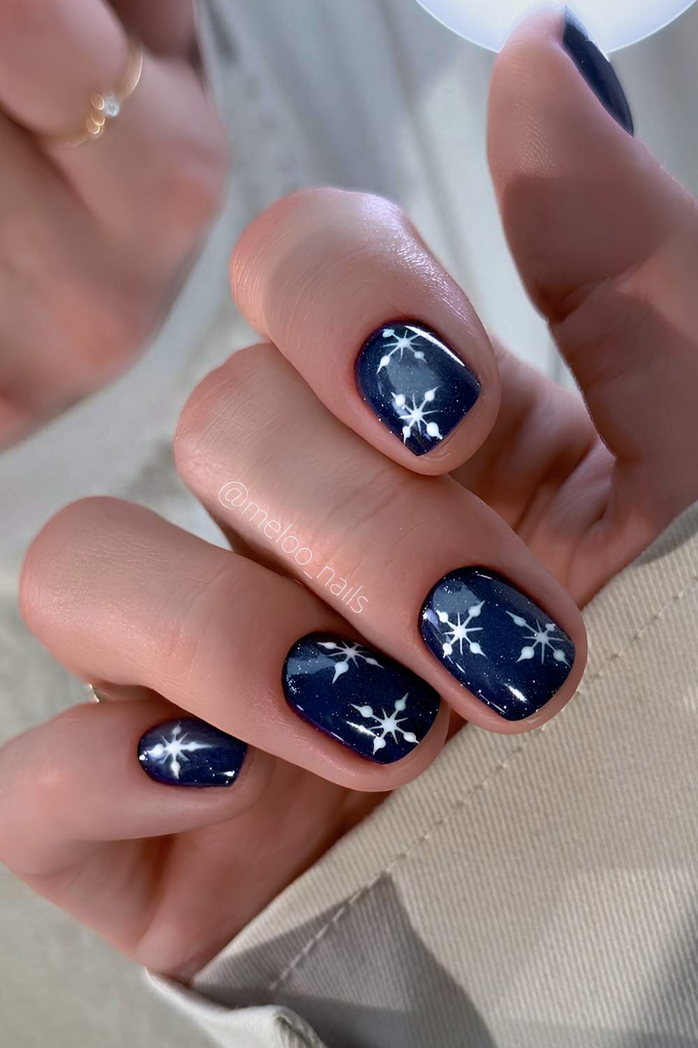 Short Navy Blue Nails With Snowflake Art snowflake nail design