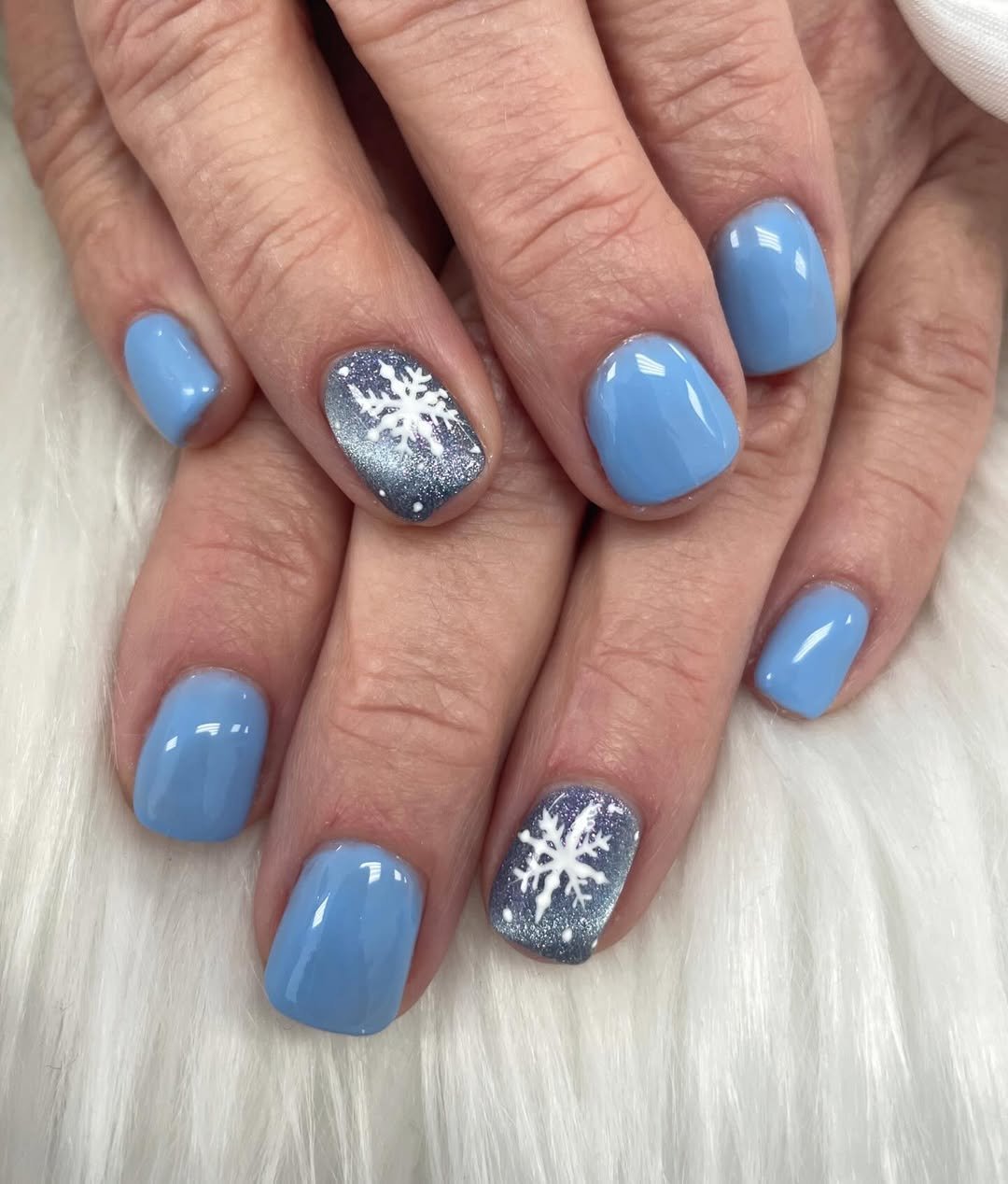 Soft Blue Nails With Classic Frost Art snowflake nail design