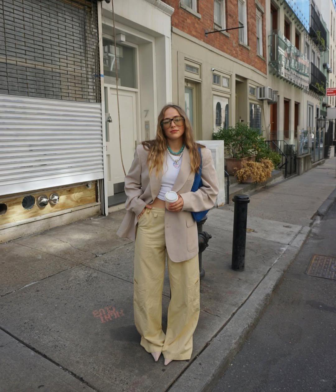 Oversized black blazer with light flowing trousers