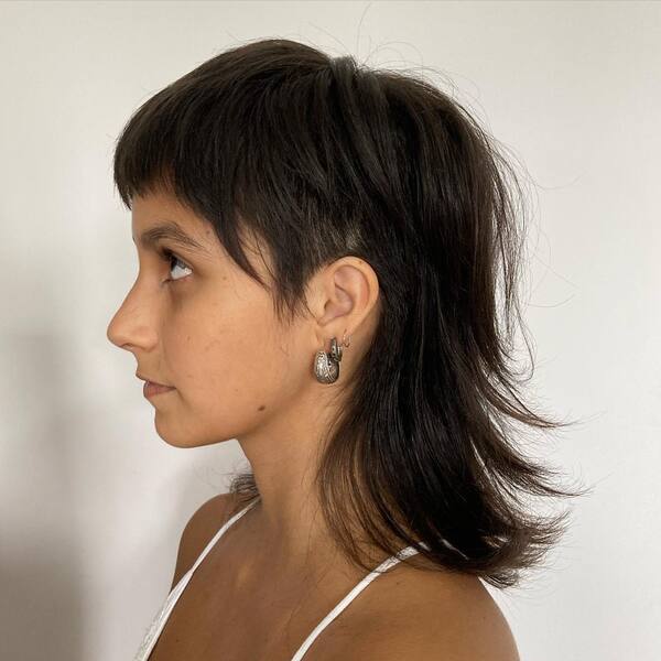 Sway mullet with short textured front layers and a flipped-out long back