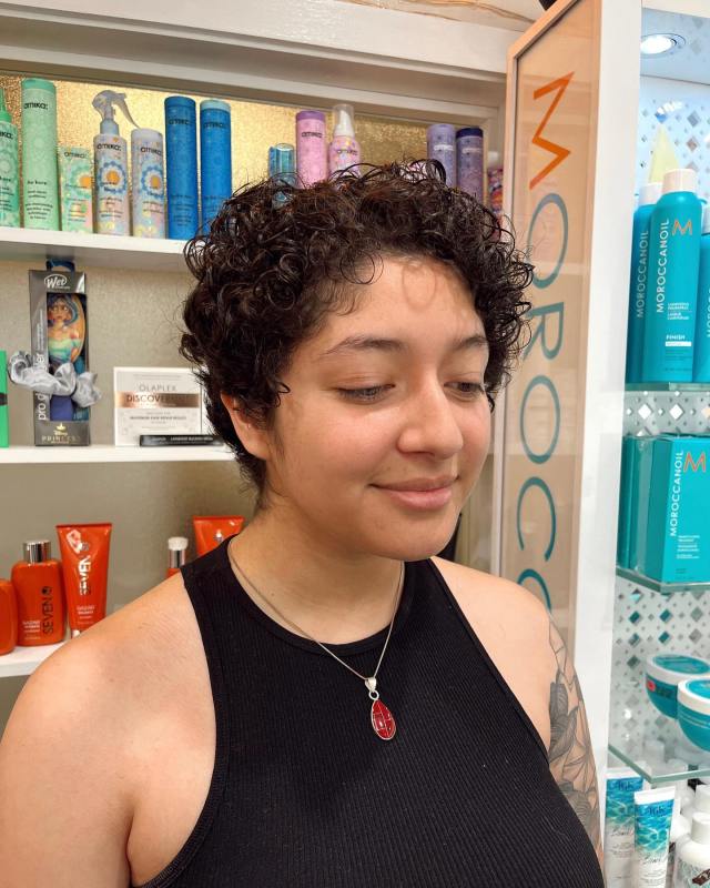 Textured curly pixie with defined curls short hair hairstyle