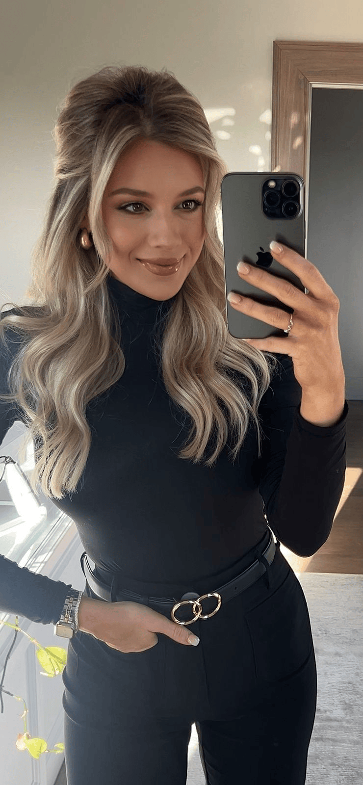All-black wide-leg pants outfit with matching black top