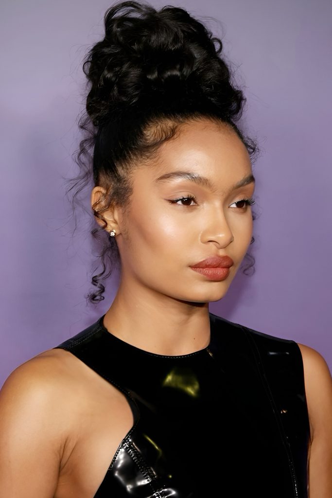 Polished top knot quick weave hairstyle