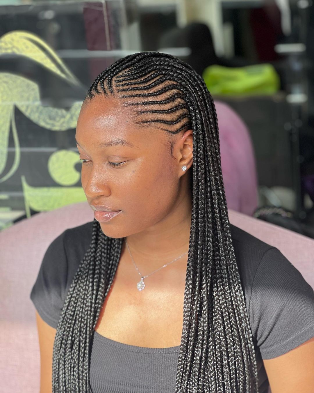 Feed-In Side Part Braids hairstyle inspiration photo