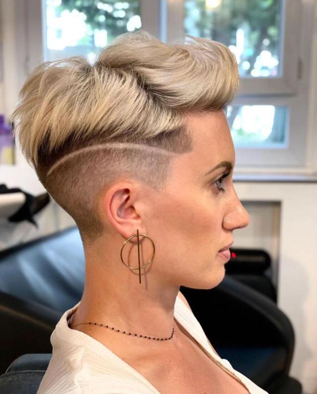 Undercut pixie with long blonde top haircut