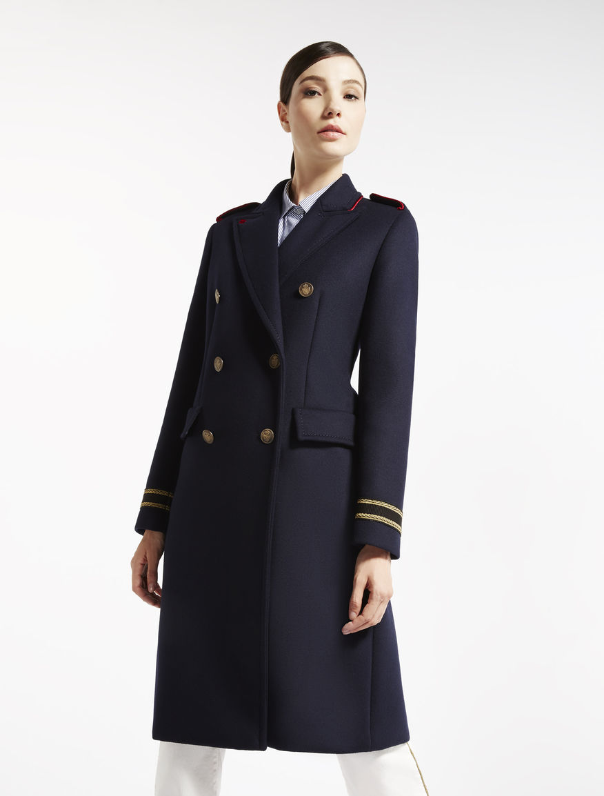 Woman in a navy military-inspired wool coat