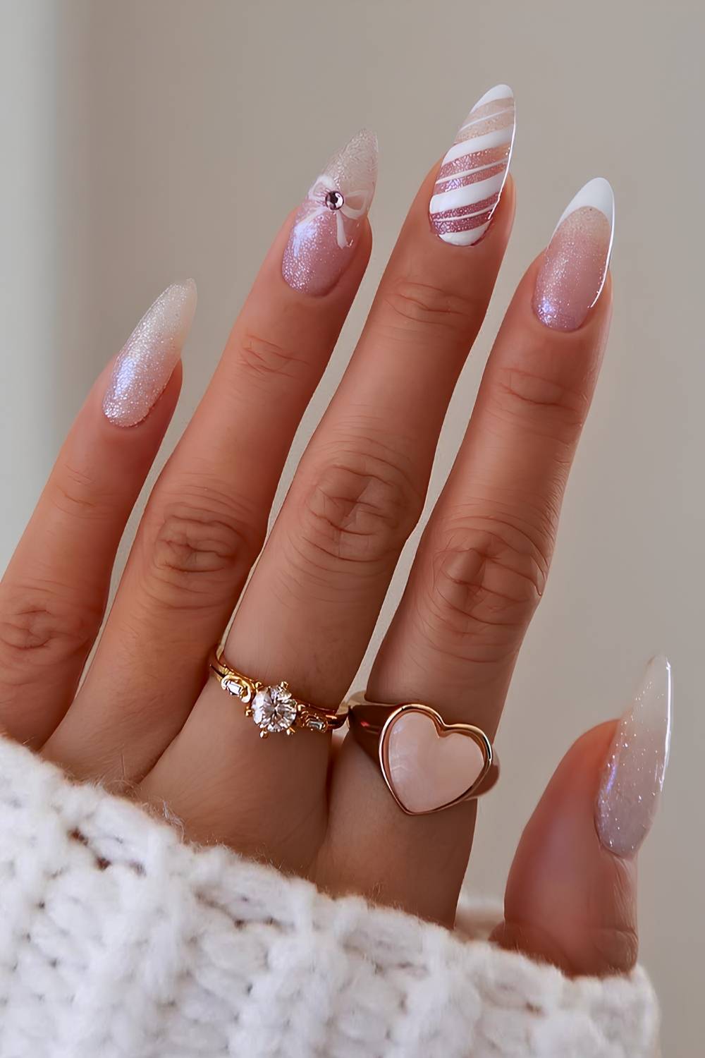 Frosted Sheer Base with Candy Stripes and Bows white Christmas nail design