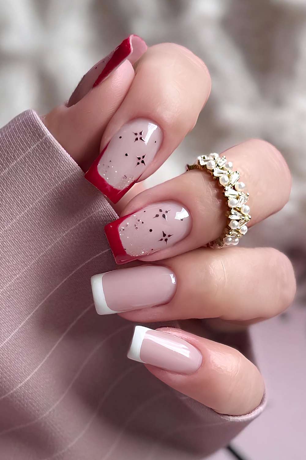 Deep Red and White French Tips with Metallic Stars red and white nail design