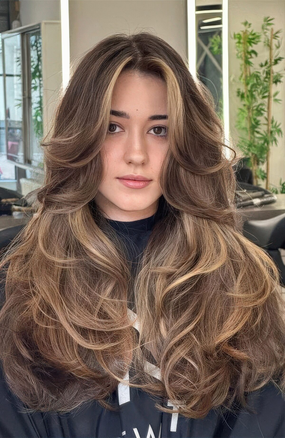 Butterfly cut with long face-framing layers
