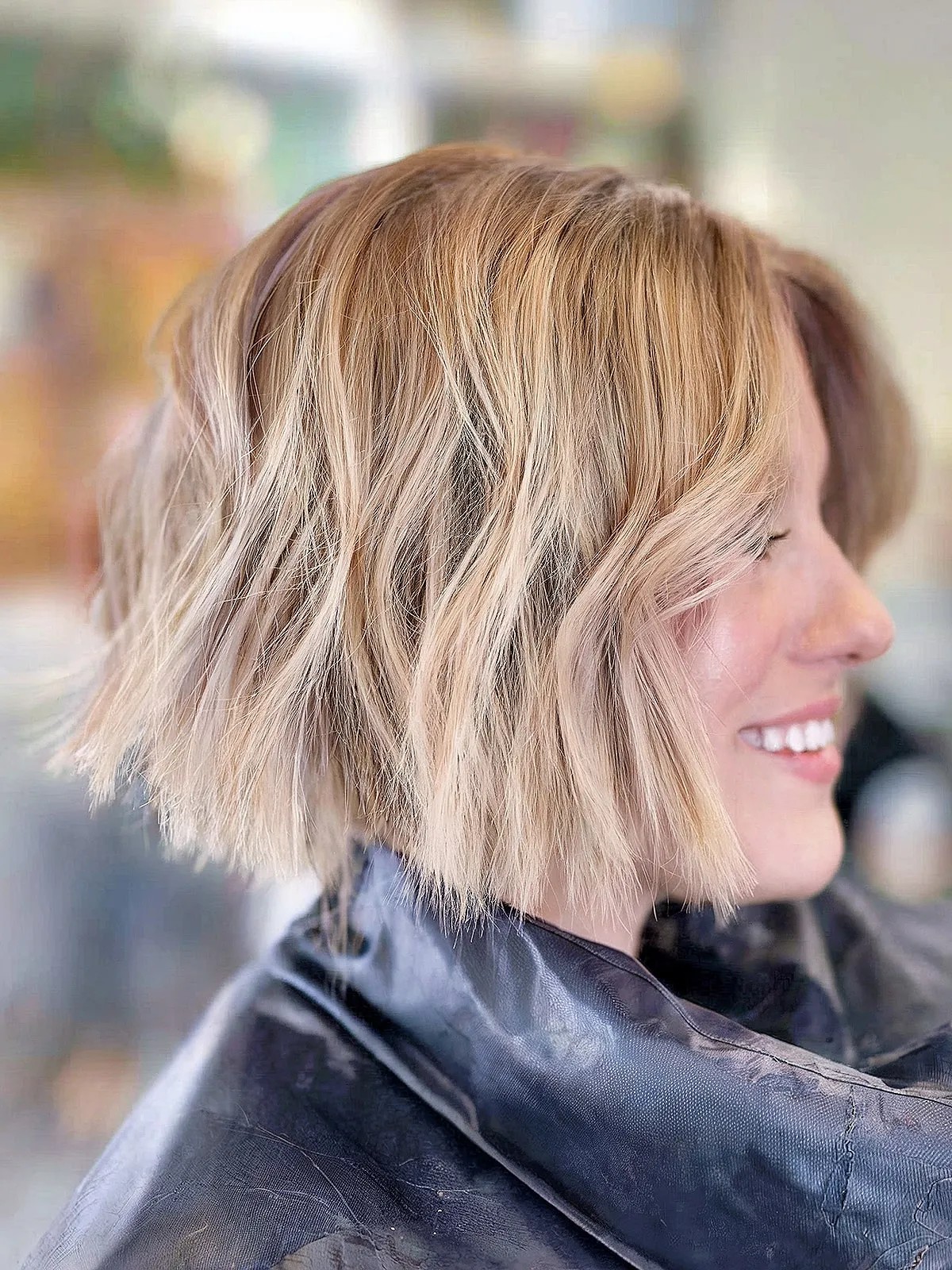 Graduated balayage bob haircut with a middle part