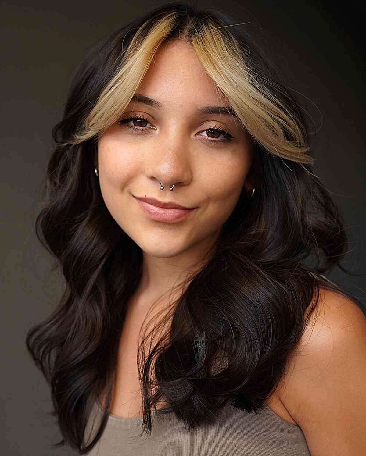Collarbone Lob with Blonde Balayage and a Side-Swept Fringe wavy hair hairstyle