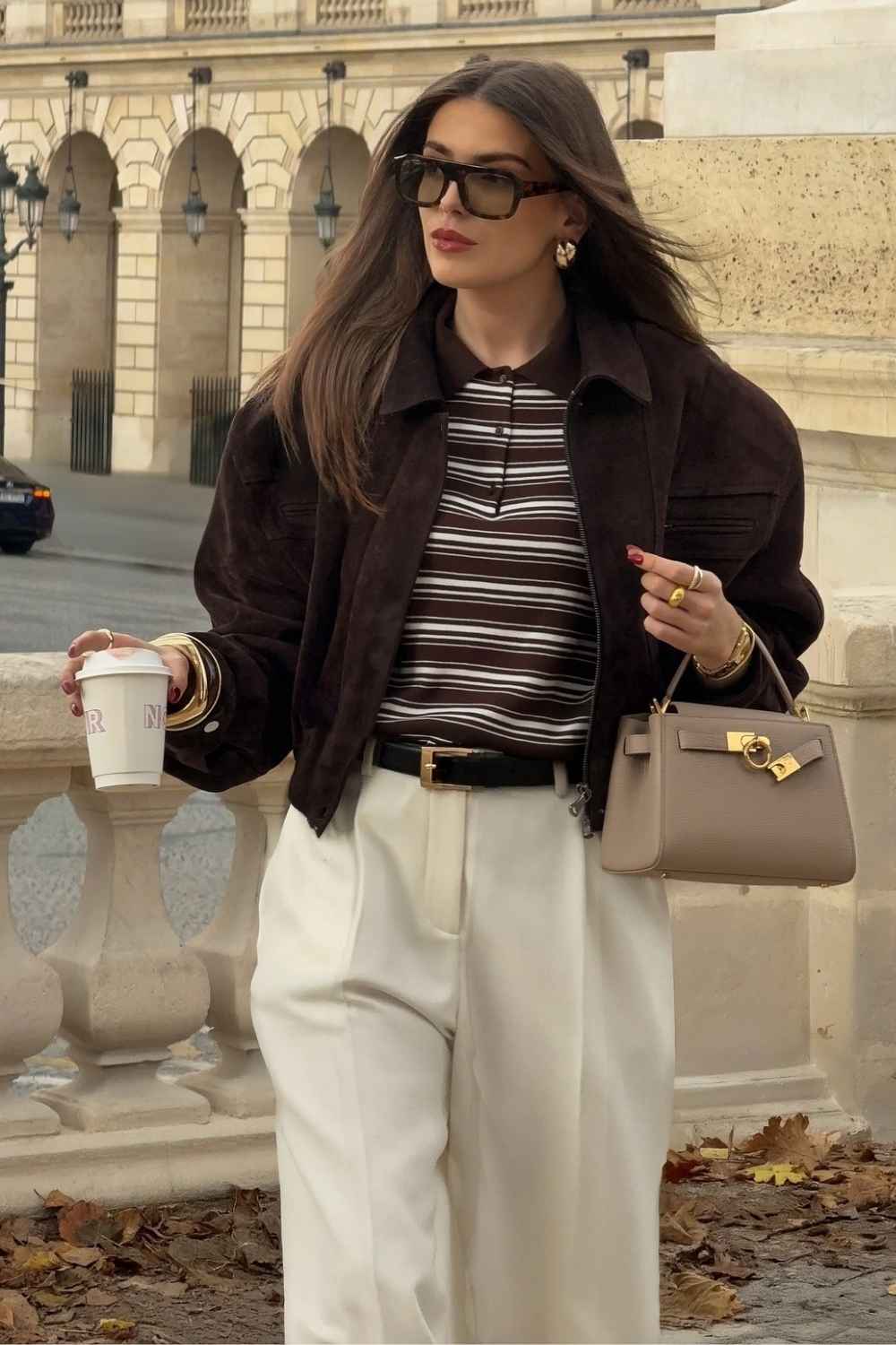 Chocolate suede jacket with striped polo and cream trousers preppy outfit