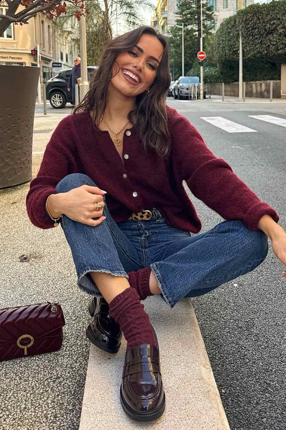 Burgundy cardigan with straight jeans and loafers preppy outfit