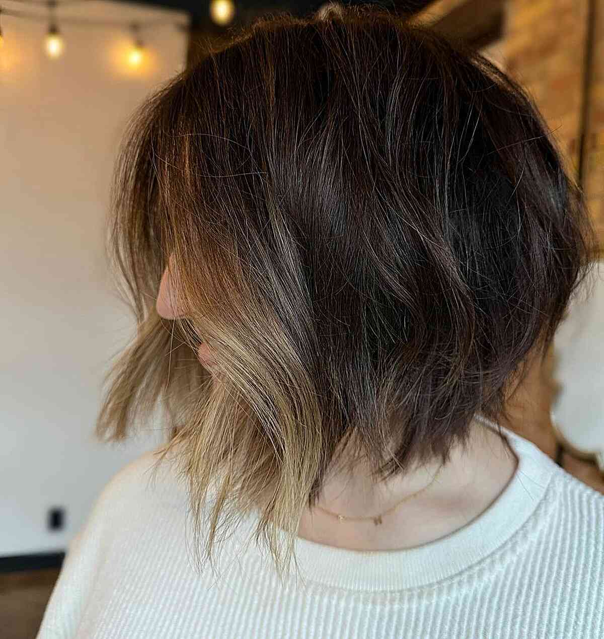 Choppy dark brown layers with bright blonde highlights