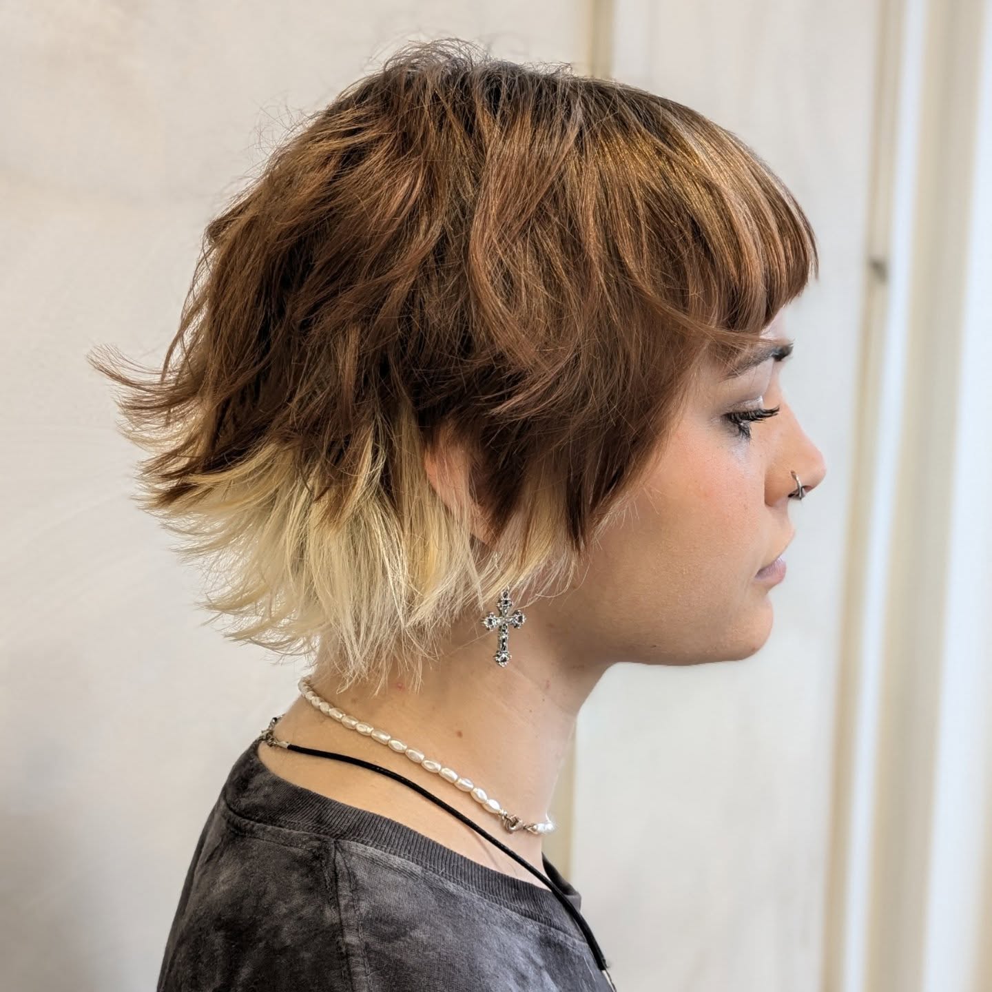 Two-tone short wolf cut with blunt mini bangs