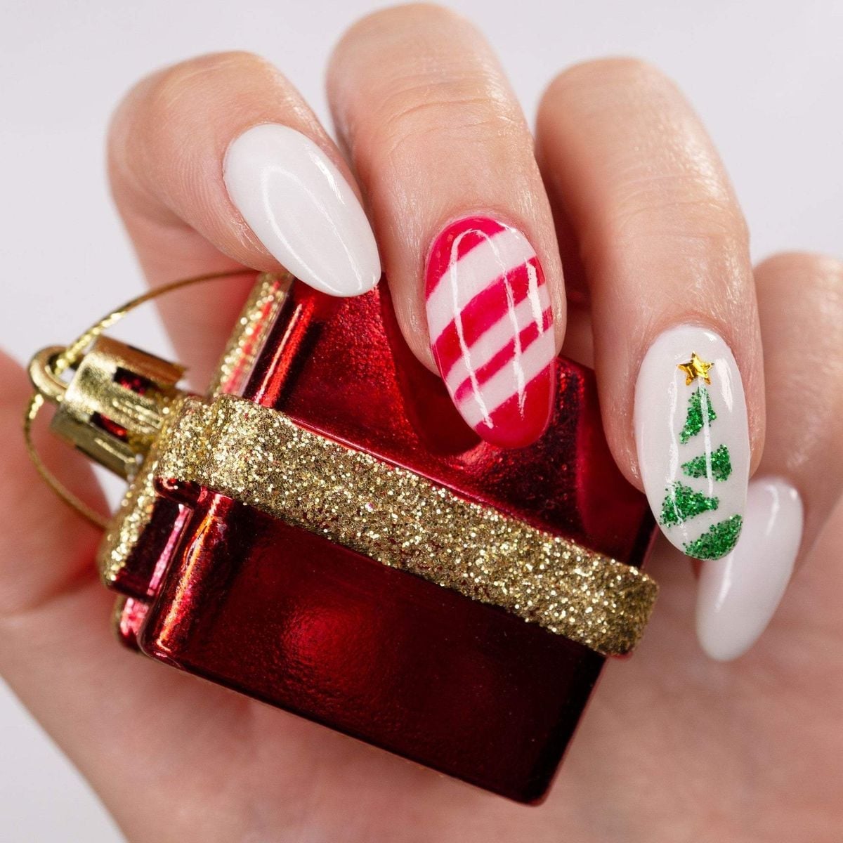 Gift Box and Snowflake Nails in White and Red holiday nail design