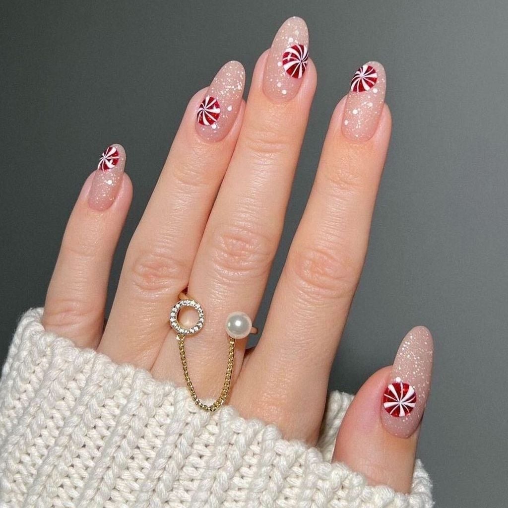 Peppermint Candy Nails on a Sheer Nude Base holiday nail design
