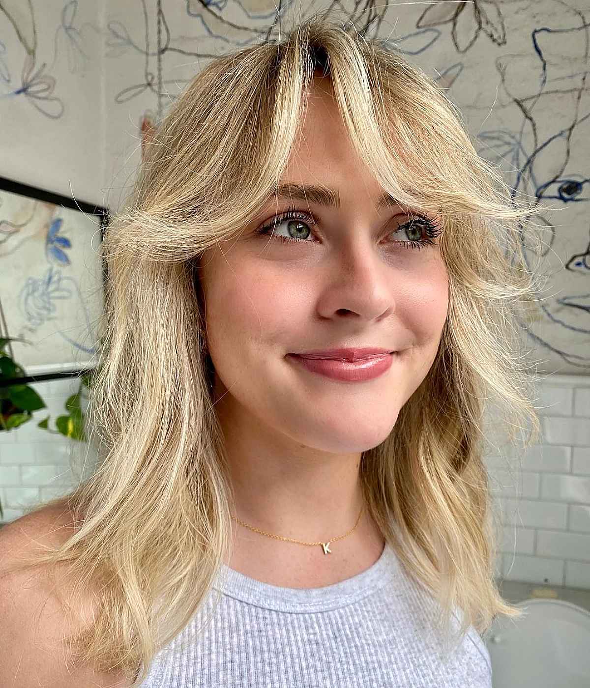 Medium shag haircut styled with chunky waves