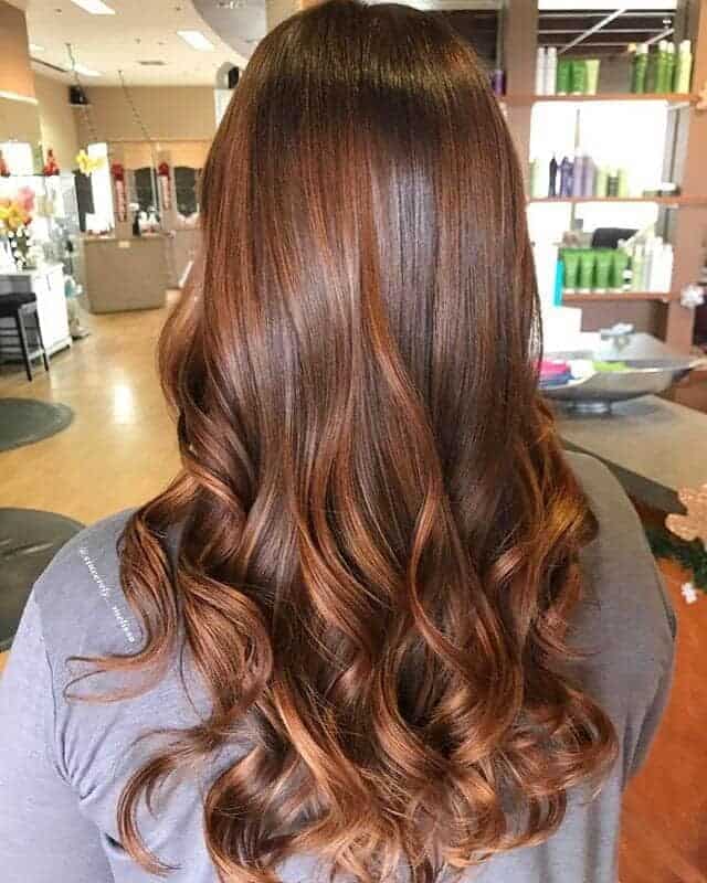Copper brown hair with caramel lowlights
