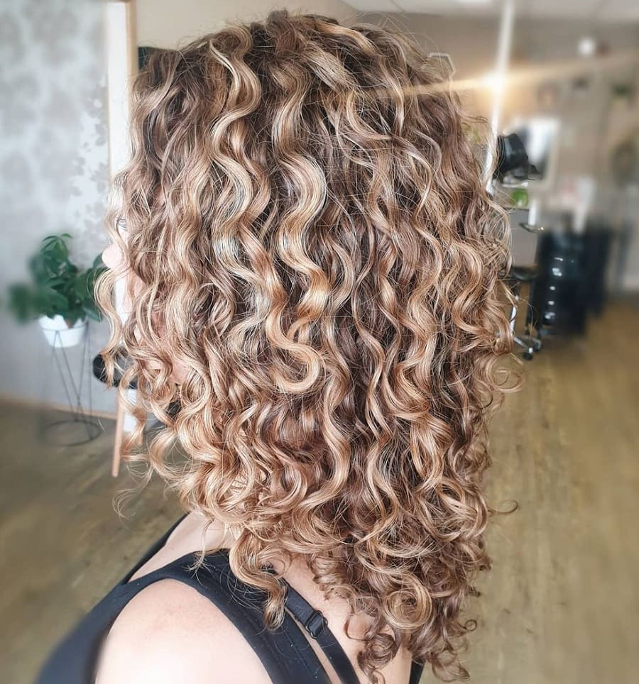 Reverse balayage on curly hair