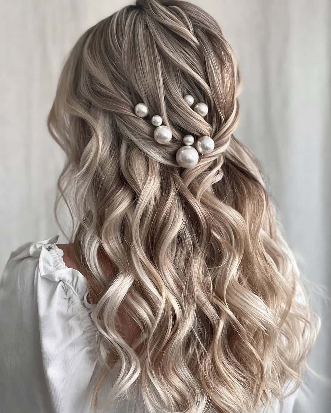 Pearl-Adorned Half-Up Hairstyle