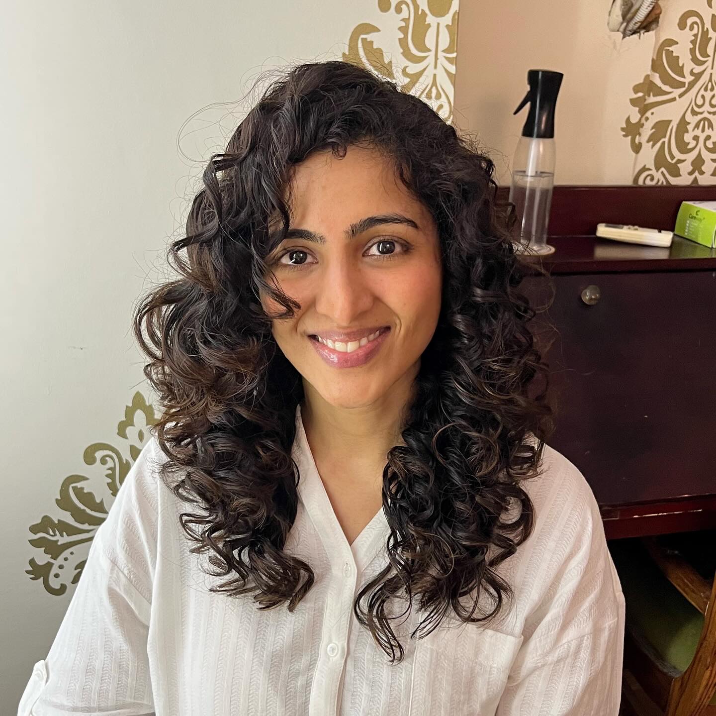 Loose wavy layers with soft pieces around the face