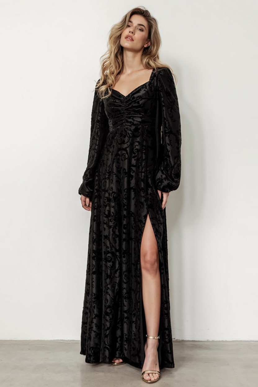 Black velvet evening gown with a high slit formal outfit