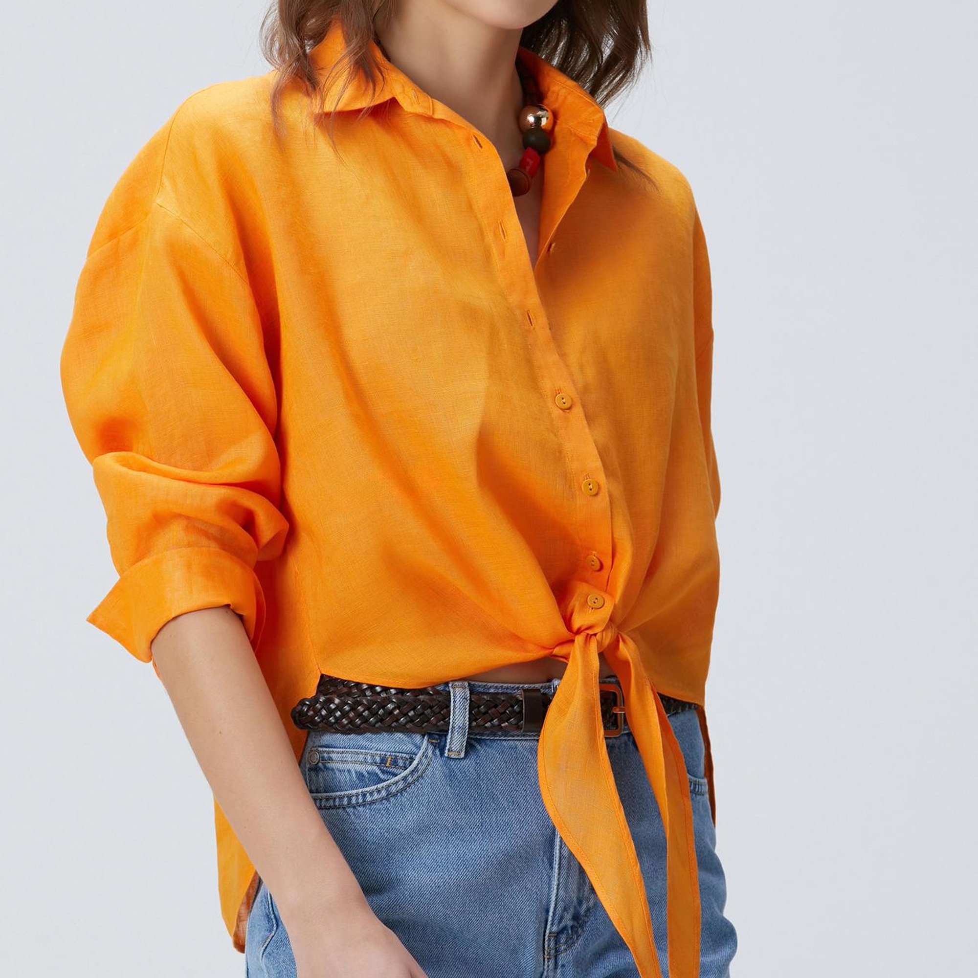 Bright Orange Linen Shirt with Wide-Leg Jeans Orange linen shirt, a bright everyday top